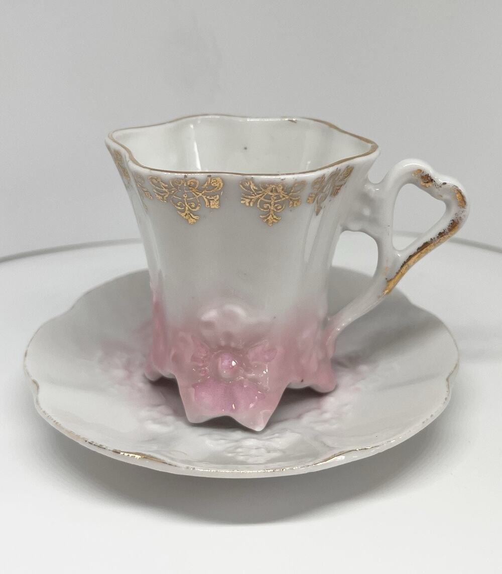 Antique Footed Teacup And Saucer